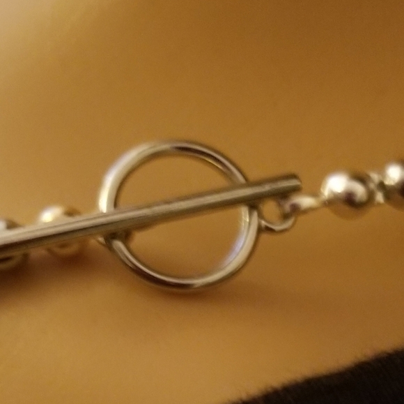 Handcrafted by Carolle. - Picture 2 of 2